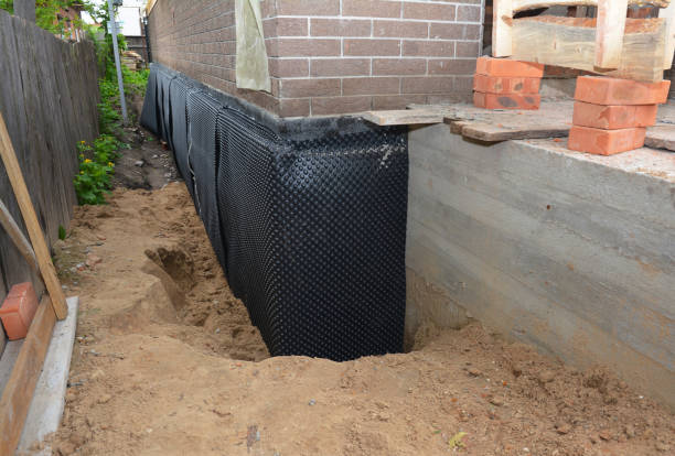 SJ Waterproofing Pros technician performing targeted Sump Pump Installation assessment in Pleasant Shade, TN